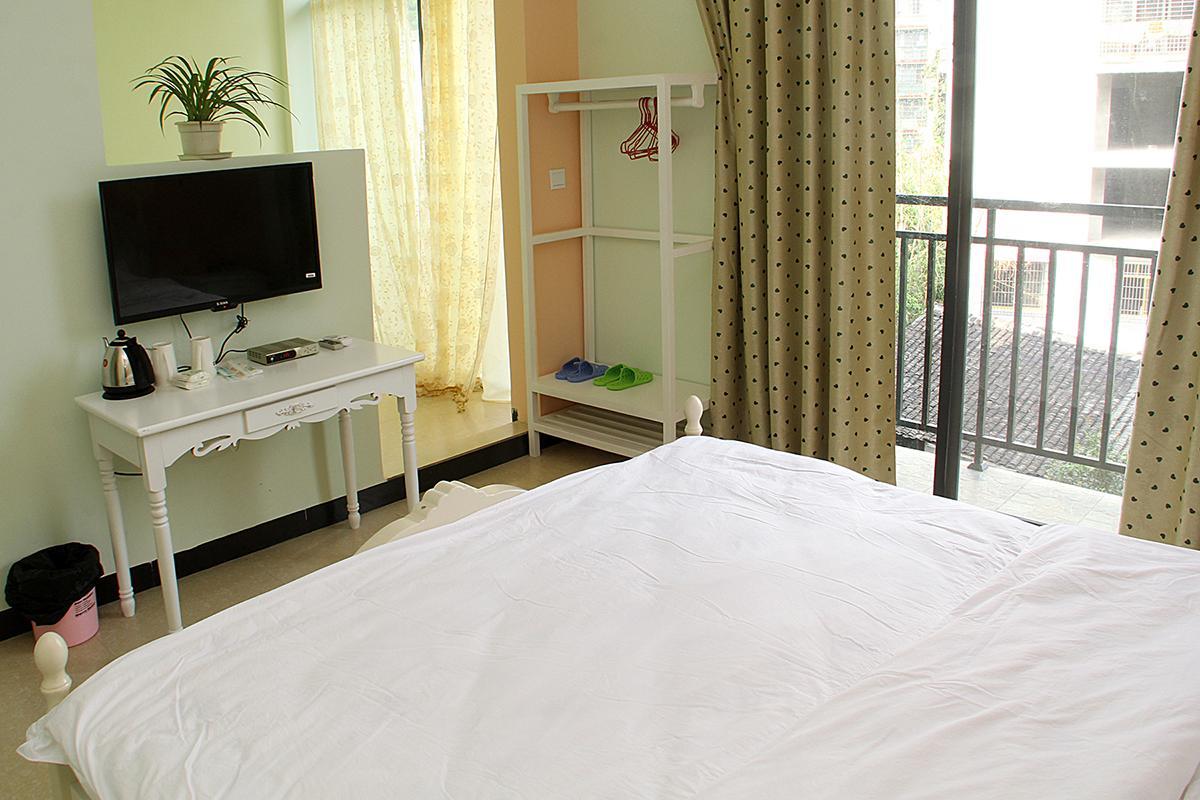 Yangshuo Shanshan Garden Hotel Rum bild